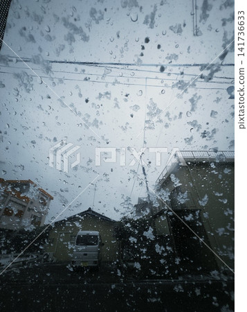 Water droplets on a car window Water droplets on a car window 141736633