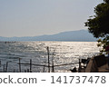 Bench facing the sea 141737478