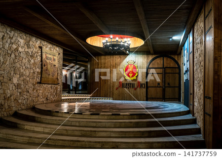 Elegant tasting hall interior decoration inside historic underground winery Elegant tasting hall interior decoration inside historic underground winery 141737759