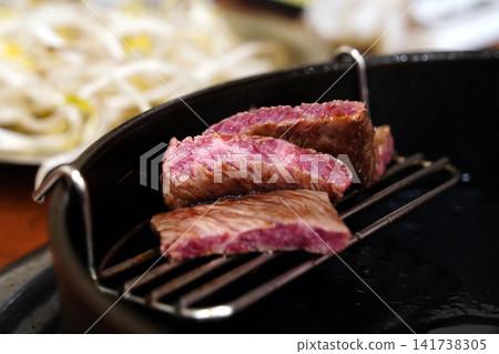 Premium Korean beef barbecue grill steak piece medium rare juicy meat Premium Korean beef barbecue grill steak piece medium rare juicy meat 141738305