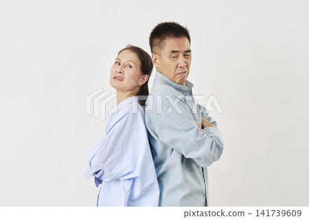 Senior couple fighting on white background Senior couple fighting on white background 141739609