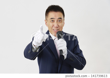 Male candidate giving a speech against a white background 141739613