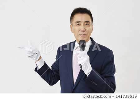 A senior election candidate points to the left against a white background. A senior election candidate points to the left against a white background. 141739619