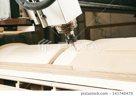 CNC milling machine. Machine tool in wood factory with drilling machines. CNC milling machine. Machine tool in wood factory with drilling machines. 141740479