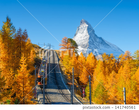 Passenger train on a railway in Switzerland. Passenger train on a railway in Switzerland. 141740561