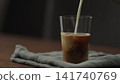 making ice latte at home closeup shot 141740769