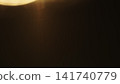 real lens flare from back sunlight over dark background for overlay 141740779
