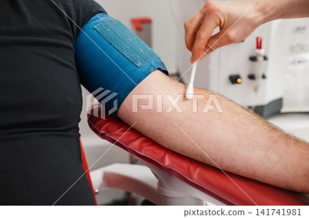 Disinfecting the Arm Before Blood Donation Disinfecting the Arm Before Blood Donation 141741981