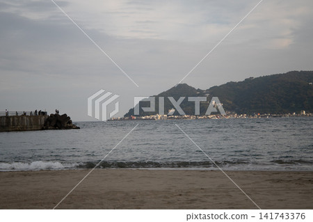 An island floating in the sea An island floating in the sea 141743376