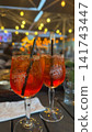 Aperol coctails on a blurred background 141743447