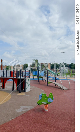 Childrens playground in the city center Childrens playground in the city center 141743449