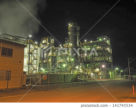 A landscape with a factory at night A landscape with a factory at night 141743534