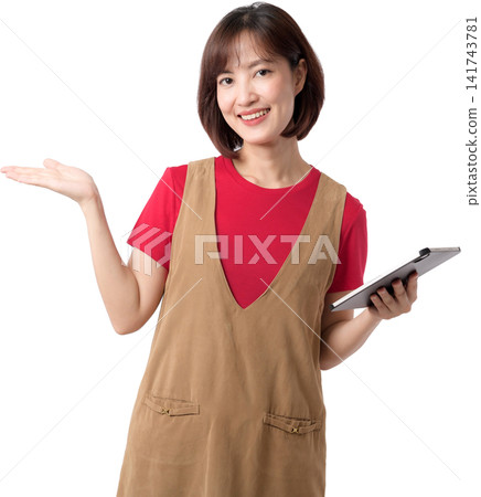 Happy smiling asian woman worker presenting open hand palm and holding digital tablet device computer on white studio background Happy smiling asian woman worker presenting open hand palm and holding digital tablet device computer on white studio background 141743781