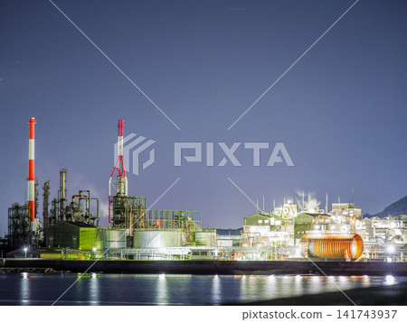 A landscape with a factory at night A landscape with a factory at night 141743937