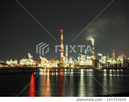 A landscape with a factory at night A landscape with a factory at night 141743939