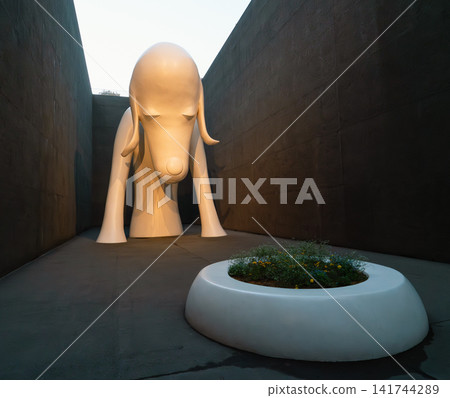 Aomori Museum of Art, Aomori, Japan - Nov. 15, 2023: Aomori Dog sculpture. Aomori Museum of Art, Aomori, Japan - Nov. 15, 2023: Aomori Dog sculpture. 141744289
