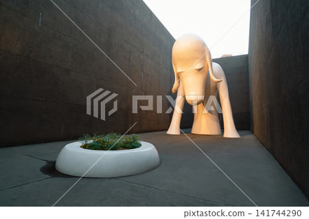 Aomori Museum of Art, Aomori, Japan - Nov. 15, 2023: Aomori Dog sculpture. Aomori Museum of Art, Aomori, Japan - Nov. 15, 2023: Aomori Dog sculpture. 141744290