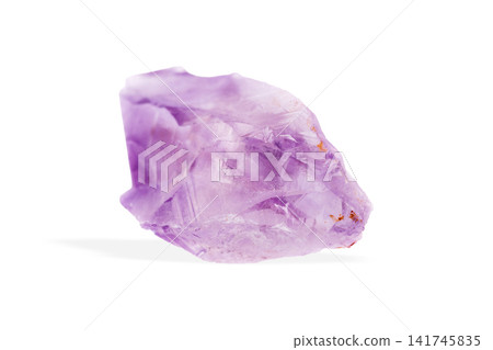 Purple gemstone druse featuring rough amethyst formations. Isolated crystal cluster displays natural Purple gemstone druse featuring rough amethyst formations. Isolated crystal cluster displays natural 141745835