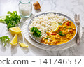 Chickpea curry with white rice on a plate 141746532