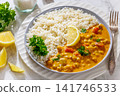 Indian chana masala dish with rice on plate 141746533