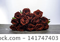 red roses on gray background 141747403