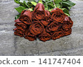 red roses on gray background 141747404
