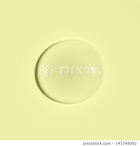 Cosmetic transparent product on a yellow background. A serum or gel or cream. Cosmetic transparent product on a yellow background. A serum or gel or cream. 141748092