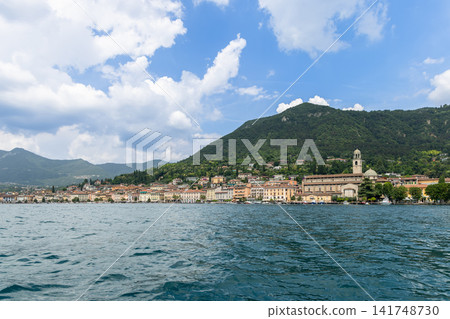 Wide summer view of the Salo waterfront from Lake Garda in northern Italy Wide summer view of the Salo waterfront from Lake Garda in northern Italy 141748730