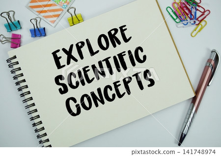 Explore Scientific Concepts text message written on notepad with stationery flat lay on white background Explore Scientific Concepts text message written on notepad with stationery flat lay on white background 141748974