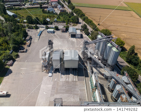 High Angle Drone View of Industrial Grain Elevator Facility and Unloading Stations High Angle Drone View of Industrial Grain Elevator Facility and Unloading Stations 141749282