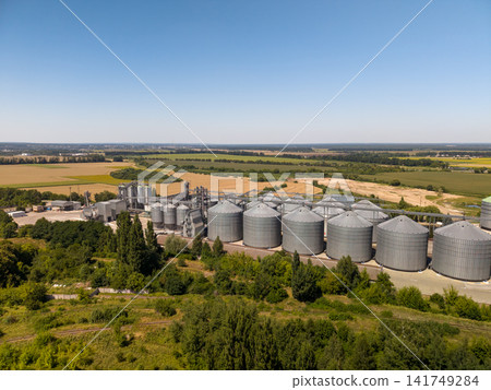 Panoramic Drone View of Modern Metal Grain Silos and Agroindustrial Complex Panoramic Drone View of Modern Metal Grain Silos and Agroindustrial Complex 141749284