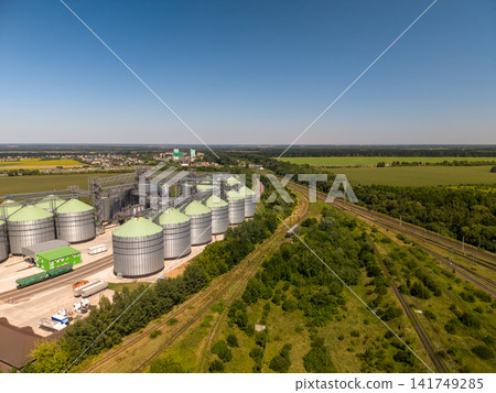Panoramic Drone View of Industrial Silo Plant and Railway Infrastructure Panoramic Drone View of Industrial Silo Plant and Railway Infrastructure 141749285