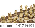 Part of wooden chessboard with figures 141749491