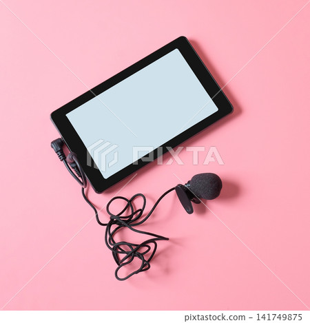 A microphone with long wire clip on smartphone .Sound record. A microphone with long wire clip on smartphone .Sound record. 141749875