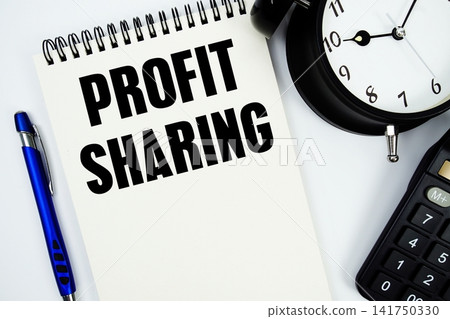 Profit Sharing text written on notepad with calculator and alarm clock Profit Sharing text written on notepad with calculator and alarm clock 141750330