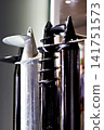 Screw metal piles in store 141751573