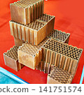 Ceramic blocks on red in store 141751574