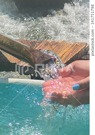 Hands Collecting Clear Water Hands Collecting Clear Water 141751798