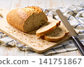 wheat bread with sourdough on white table, selective focus. 141751867