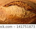 close up of wheat bread with sourdough , food textured. Background of wheat bread with sourdough. wheat bread close up. 141751873