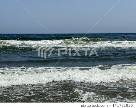 Ocean Waves Rolling on the Shore at Asbury Park Beach in New Jersey Ocean Waves Rolling on the Shore at Asbury Park Beach in New Jersey 141751930