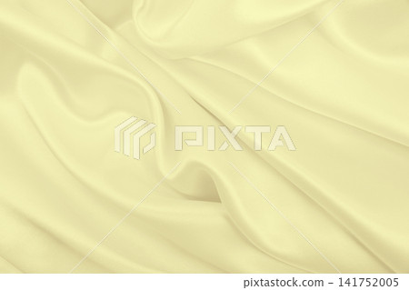 Smooth elegant golden silk or satin luxury cloth texture as wedding background. Luxurious background design. In Sepia toned. Retro style Smooth elegant golden silk or satin luxury cloth texture as wedding background. Luxurious background design. In Sepia toned. Retro style 141752005