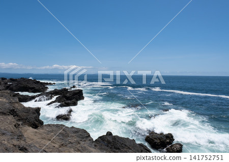 A clear, sunny day at the coast of Jogashima Island in Miura City, Kanagawa Prefecture, with waves crashing against the shore. A clear, sunny day at the coast of Jogashima Island in Miura City, Kanagawa Prefecture, with waves crashing against the shore. 141752751