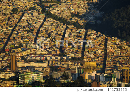 Curious urban geometry of San Juan neighborhood in Quito at sunrise with golden light. Curious urban geometry of San Juan neighborhood in Quito at sunrise with golden light. 141753553