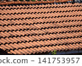 Close up texture of traditional weathered terracotta roof tiles Close up texture of traditional weathered terracotta roof tiles 141753957