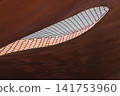 Abstract view of a rusted metal structure with rope netting Abstract view of a rusted metal structure with rope netting 141753960