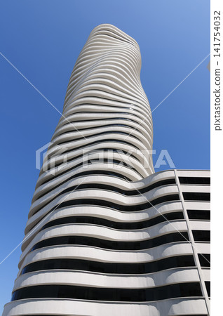 The Point building with its helical architecture in Guayaquil, Ecuador, under a clear sky The Point building with its helical architecture in Guayaquil, Ecuador, under a clear sky 141754032