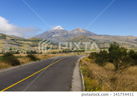 Road to the Illinizas in the Ecuadorian Andes under a Summer Blue Sky Road to the Illinizas in the Ecuadorian Andes under a Summer Blue Sky 141754431
