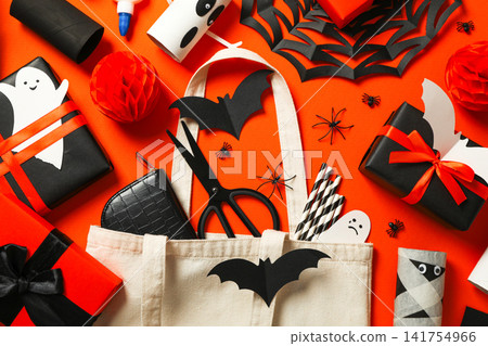 Halloween. Craft supplies and decorations are arranged for Halloween festivities Halloween. Craft supplies and decorations are arranged for Halloween festivities 141754966