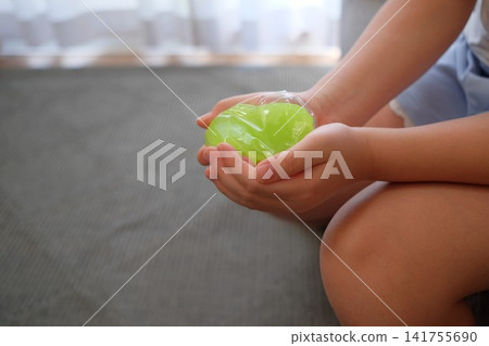 Squishy toy (by a primary school student's hand) Squishy toy (by a primary school student's hand) 141755690